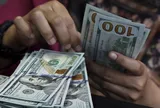 Đi nước ngoài được mang tối đa bao nhiêu USD tiền mặt?