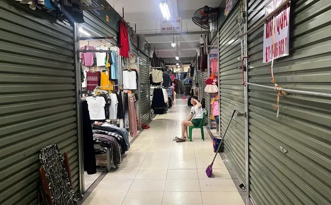Hướng dẫn, giải thích rõ cho tiểu thương yên tâm kinh doanh
